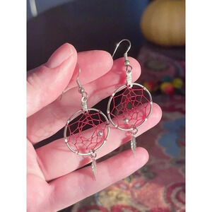 Silver dreamcatcher dangling earring with father detail and red thread